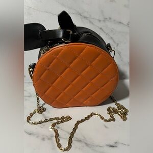 Round Quilted Two-Tone Crossbody Bag